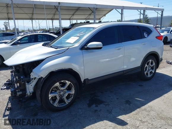 2019 Honda CR-V EX z VIN 5J6RW1H59KA012571, wystawiony jako IAAI lot #41830202 z przebiegiem 49 987 mil mil oraz . Historia ofert i sprzedaży dostępna na DreamBid. Obrazek 18.