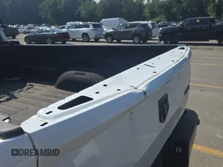 2022 Ram 1500 Tradesman with VIN 3C6JR7DG7NG276051, listed as a IAAI auction lot 42832410 with 29,141 mi miles and . Bid and sale history available at DreamBid. Image 4.