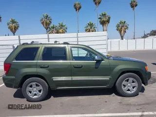 2006 Jeep Grand Cherokee Overland with VIN 1J8HR68286C331619, listed as a IAAI auction lot 42550576 with 196,937 mi miles and . Bid and sale history available at DreamBid. Image 13.
