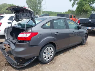 2012 Ford Focus SE with VIN 1FAHP3F26CL186645, listed as a IAAI auction lot 42458819 with 99,470 mi miles and . Bid and sale history available at DreamBid. Image 4.