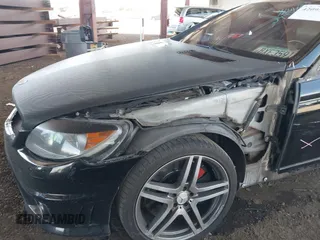 2009 Mercedes-Benz CL V8 AMG with VIN WDDEJ77X79A022220, listed as a IAAI auction lot 42095679 with 155,333 mi miles. Bid and sale history available at carsss.com. Image 6.