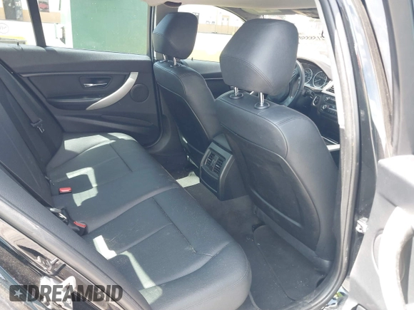 2014 BMW 3 Series 320i with VIN WBA3B1C55EK135357, listed as a IAAI auction lot 42158550 with 148,911 mi miles. Bid and sale history available at carsss.com. Image 8.