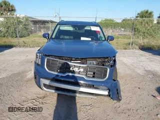 2025 Kia Telluride S with VIN 5XYP64GCXSG587826, listed as a IAAI auction lot 42065749 with 1,864 mi miles and . Bid and sale history available at DreamBid. Image 12.