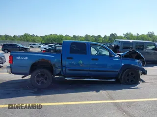 2005 Dodge Dakota SLT with VIN 1D7HW48N05S319621, listed as a IAAI auction lot 42037140 with 251,595 mi miles and . Bid and sale history available at DreamBid. Image 13.
