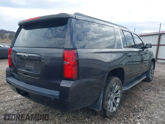 2015 Chevrolet Suburban LT with VIN 1GNSKJKC8FR717435, listed as a IAAI auction lot 41313726 with 120,731 mi miles and . Bid and sale history available at DreamBid. Image 4.