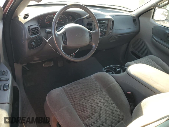 2002 Ford F-150 XL with VIN 1FTRX18L82NA54692, listed as a Copart auction lot 62559605 with 216,350 mi miles and Salvage title. Bid and sale history available at DreamBid. Image 8.