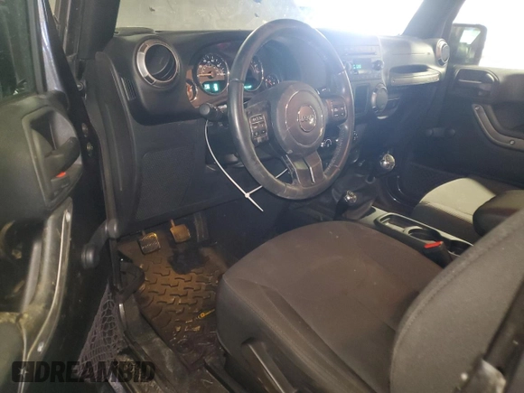 2017 Jeep Wrangler Willys Wheeler with VIN 1C4AJWAG3HL751703, listed as a Copart auction lot 88861635 with 14,114 mi miles and Salvage Title. Bid and sale history available at DreamBid. Image 8.