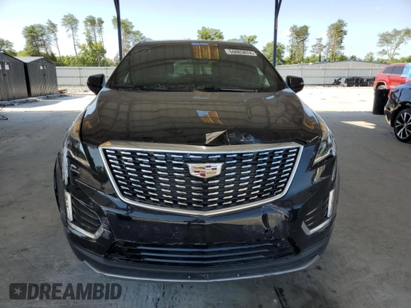 2021 Cadillac XT5 FWD Premium Luxury с VIN 1GYKNCRSXMZ155473, выставлен на аукционе Copart как лот 59883874 с пробегом 2 038 миль миль и Списание • Salvage title. История ставок и продаж доступна на DreamBid. Изображение 5.