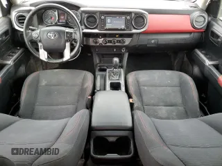 2017 Toyota Tacoma SR5 z VIN 3TMCZ5AN7HM094624, wystawiony jako Copart lot #58166405 z przebiegiem 84 877 mil mil oraz Szkoda całkowita • Salvage title. Historia ofert i sprzedaży dostępna na DreamBid. Obrazek 8.