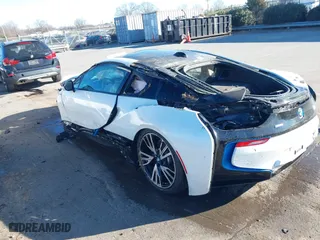 2015 BMW i8 with VIN WBY2Z2C51FV392854, listed as a IAAI auction lot 41282895 with 77,533 mi miles. Bid and sale history available at carsss.com. Image 3.