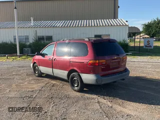 1999 Toyota Sienna LE with VIN 4T3ZF13C5XU141279, listed as a Copart auction lot 64366315 with 218,223 mi miles and Clean title. Bid and sale history available at DreamBid. Image 3.