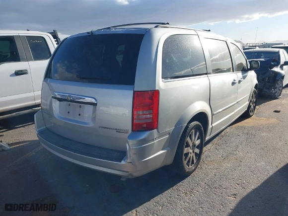 2010 Chrysler Town & Country Touring with VIN 2A4RR5D10AR241247, listed as a IAAI auction lot 41767320 with 130,260 mi miles. Bid and sale history available at carsss.com. Image 4.