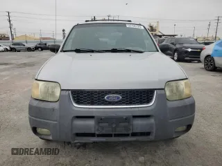 2002 Ford Escape XLT Choice с VIN 1FMYU03112KB30061, выставлен на аукционе Copart как лот 53195125 с пробегом 177 920 миль миль и Списание • Salvage title. История ставок и продаж доступна на DreamBid. Изображение 5.