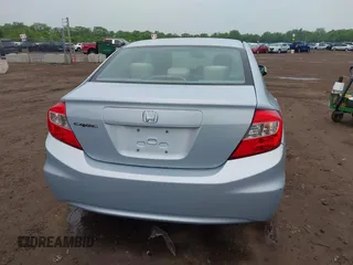 2012 Honda Civic LX z VIN 19XFB2F54CE018953, wystawiony jako IAAI lot #42346090 z przebiegiem 156 370 mil mil oraz . Historia ofert i sprzedaży dostępna na DreamBid. Obrazek 16.