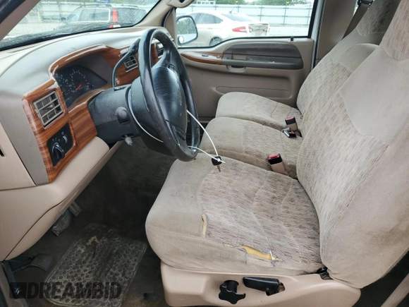 1999 Ford F-250 XL with VIN 1FTNX20S1XEB68189, listed as a Copart auction lot 60920605 with 209,822 mi miles and Salvage title. Bid and sale history available at DreamBid. Image 7.