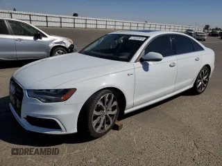 2015 Audi A6 3.0T Prestige with VIN WAUHGAFC7FN030286, listed as a Copart auction lot 71237874 with 74,334 mi miles and Salvage Title. Bid and sale history available at carsss.com. Image 1.