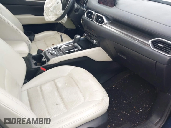2019 Mazda CX-5 Grand Touring with VIN JM3KFBDM8K1521231, listed as a IAAI auction lot 42738963 with 32,179 mi miles and . Bid and sale history available at DreamBid. Image 5.