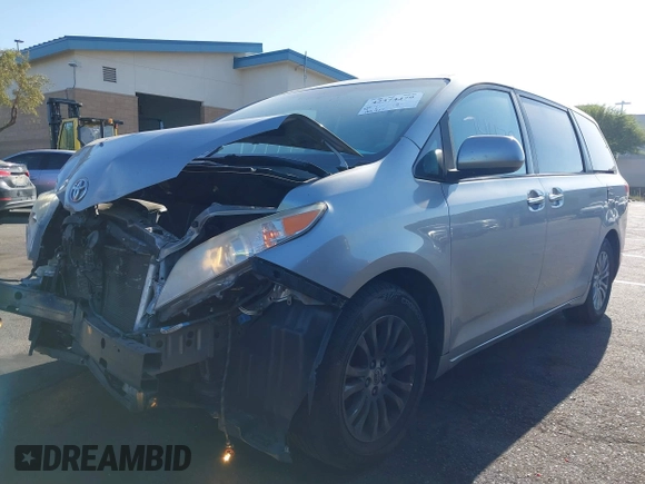 2013 Toyota Sienna XLE AAS with VIN 5TDYK3DC8DS318180, listed as a IAAI auction lot 42374479 with 189,977 mi miles and . Bid and sale history available at DreamBid. Image 18.