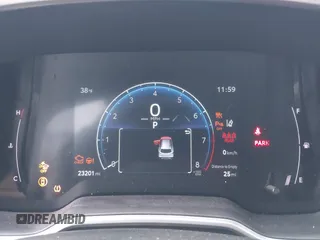 2023 Toyota Corolla Cross XLE z VIN 7MUDAABG0PV077852, wystawiony jako IAAI lot #41313640 z przebiegiem 23 201 mil mil oraz . Historia ofert i sprzedaży dostępna na DreamBid. Obrazek 7.