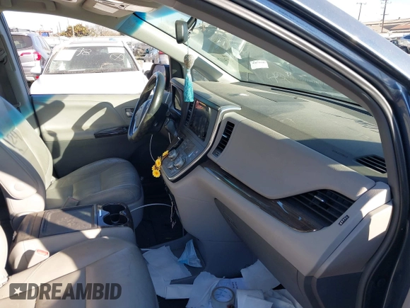 2016 Toyota Sienna XLE with VIN 5TDYK3DC8GS720852, listed as a IAAI auction lot 41341268 with 119,927 mi miles. Bid and sale history available at carsss.com. Image 5.