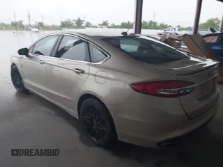2017 Ford Fusion Titanium with VIN 3FA6P0K96HR346749, listed as a IAAI auction lot 42464431 with 134,933 mi miles and . Bid and sale history available at DreamBid. Image 3.