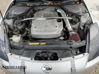 2004 Nissan 350Z Enthusiast z VIN JN1AZ36A74T013105, wystawiony jako Copart lot #82797874 z przebiegiem Nie podano mil oraz Szkoda całkowita • Salvage title. Historia ofert i sprzedaży dostępna na DreamBid. Obrazek 12.