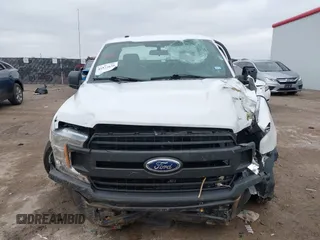 2019 Ford F-150 XL with VIN 1FTMF1CB3KKE16540, listed as a IAAI auction lot 41572630 with 73,954 mi miles and . Bid and sale history available at DreamBid. Image 12.