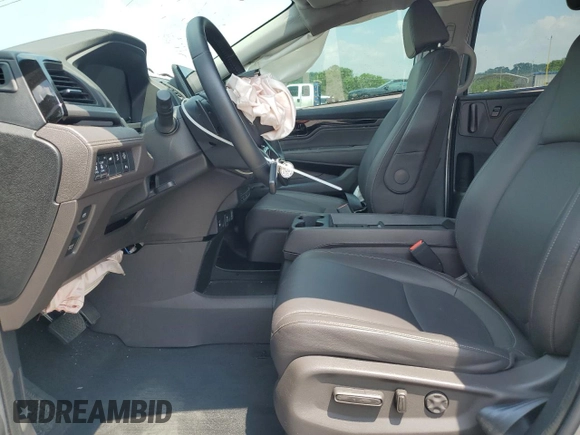 2023 Honda Odyssey Touring z VIN 5FNRL6H8XPB037385, wystawiony jako Copart lot #59461215 z przebiegiem 32 150 mil mil oraz Szkoda całkowita • Salvage title. Historia ofert i sprzedaży dostępna na DreamBid. Obrazek 7.