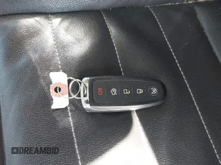 2013 Ford Escape SEL с VIN 1FMCU9HX4DUC34174, выставлен на аукционе IAAI как лот 41781517 с пробегом Не указан миль и . История ставок и продаж доступна на DreamBid. Изображение 11.