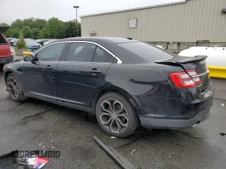 2013 Ford Taurus SHO with VIN 1FAHP2KT6DG211496, listed as a Copart auction lot 63424445 with 123,742 mi miles and Salvage title. Bid and sale history available at DreamBid. Image 2.