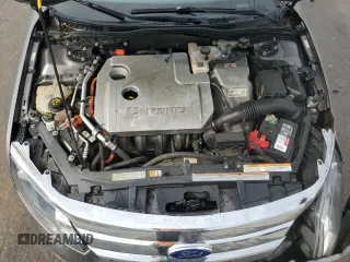 2012 Ford Fusion Hybrid z VIN 3FADP0L33CR211609, wystawiony jako Copart lot #60873005 z przebiegiem 144 474 mil mil oraz Szkoda całkowita • Salvage title. Historia ofert i sprzedaży dostępna na DreamBid. Obrazek 11.