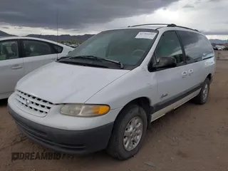 1999 Plymouth Voyager Grand SE z VIN 1P4GP44G5XB637050, wystawiony jako IAAI lot #41702235 z przebiegiem 335 309 mil mil oraz . Historia ofert i sprzedaży dostępna na DreamBid. Obrazek 2.