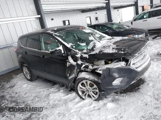 2019 Ford Escape SE z VIN 1FMCU9GD3KUC06466, wystawiony jako IAAI lot #41576503 z przebiegiem 71 943 mil mil oraz . Historia ofert i sprzedaży dostępna na DreamBid. Obrazek 1.