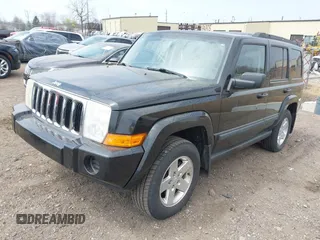 2007 Jeep Commander Sport with VIN 1J8HG48K17C651084, listed as a IAAI auction lot 42064395 with 212,057 mi miles. Bid and sale history available at carsss.com. Image 2.