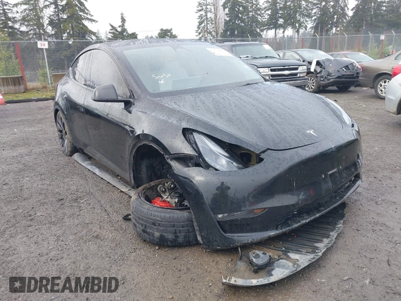 2021 Tesla Model Y Performance z VIN 5YJYGDEF2MF215938, wystawiony jako IAAI lot #41338287 z przebiegiem 63 925 mil mil oraz . Historia ofert i sprzedaży dostępna na DreamBid. Obrazek 6.