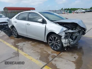 2018 Toyota Corolla L with VIN 2T1BURHEXJC014934, listed as a IAAI auction lot 40118519 with 102,847 mi miles and . Bid and sale history available at DreamBid. Image 1.