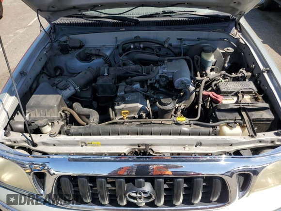 2002 Toyota Tacoma z VIN 5TEVL52N22Z052431, wystawiony jako Copart lot #66226715 z przebiegiem 169 337 mil mil oraz Szkoda całkowita • Salvage title. Historia ofert i sprzedaży dostępna na DreamBid. Obrazek 11.