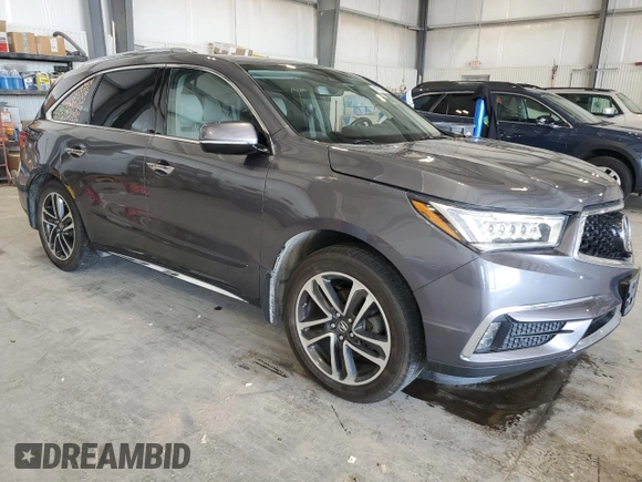 2017 Acura MDX Advance with VIN 5FRYD4H82HB001719, listed as a Copart auction lot 54055205 with 106,527 mi miles and Salvage title. Bid and sale history available at DreamBid. Image 4.