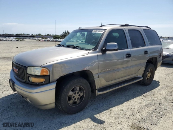 2003 GMC Yukon Denali with VIN 1GKEK63U13J255146, listed as a Copart auction lot 53694665 with 256,523 mi miles and Salvage Title. Bid and sale history available at carsss.com. Image 1.