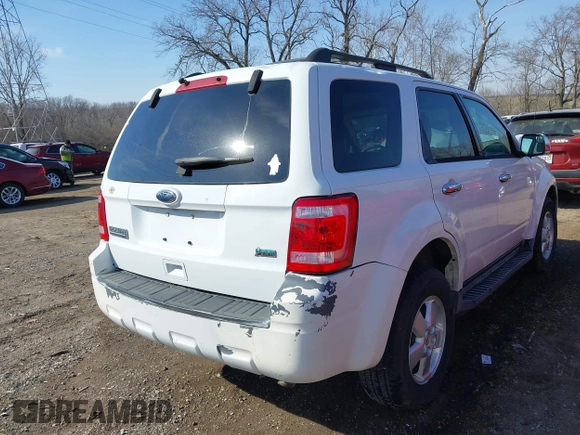2010 Ford Escape XLT z VIN 1FMCU9DG2AKC22117, wystawiony jako IAAI lot #41782394 z przebiegiem 96 841 mil mil oraz . Historia ofert i sprzedaży dostępna na DreamBid. Obrazek 4.