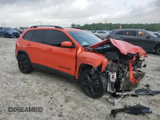 2021 Jeep Cherokee Altitude with VIN 1C4PJLLBXMD134300, listed as a Copart auction lot 54477235 with 153,002 mi miles and Salvage title. Bid and sale history available at DreamBid. Image 4.
