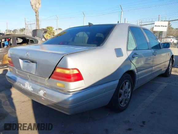 1996 Mercedes-Benz S 320 with VIN WDBGA32E9TA307279, listed as a IAAI auction lot 41631747 with 189,048 mi miles and . Bid and sale history available at DreamBid. Image 4.