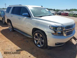 2015 Chevrolet Tahoe LTZ z VIN 1GNSKCKC7FR115444, wystawiony jako IAAI lot #42113903 z przebiegiem 162 383 mil mil oraz . Historia ofert i sprzedaży dostępna na DreamBid. Obrazek 1.