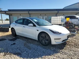 2021 Tesla Model 3 Standard Range Plus with VIN 5YJ3E1EA7MF089997, listed as a Copart auction lot 81528284 with 147,242 mi miles and Clean Title. Bid and sale history available at DreamBid. Image 4.