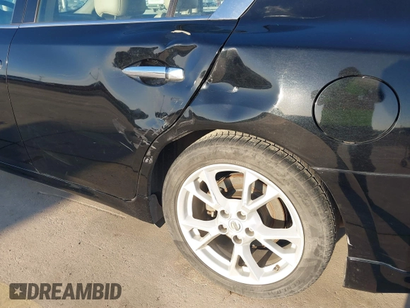 2013 Nissan Maxima S z VIN 1N4AA5AP2DC823212, wystawiony jako IAAI lot #41195799 z przebiegiem 216 924 mil mil oraz . Historia ofert i sprzedaży dostępna na DreamBid. Obrazek 6.