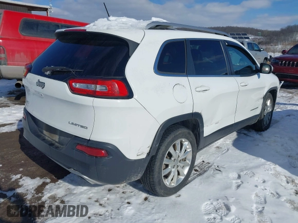 2015 Jeep Cherokee Limited with VIN 1C4PJMDS9FW718151, listed as a IAAI auction lot 41344018 with 124,185 mi miles and . Bid and sale history available at DreamBid. Image 4.