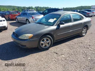 2005 Ford Taurus SE with VIN 1FAFP532X5A272398, listed as a IAAI auction lot 42001798 with 159,199 mi miles. Bid and sale history available at carsss.com. Image 2.