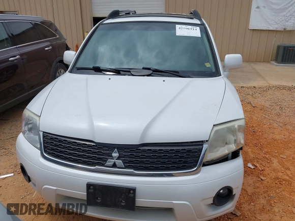 2011 Mitsubishi Endeavor z VIN 4A4JM3AS2BE037110, wystawiony jako IAAI lot #42106914 z przebiegiem 160 327 mil mil oraz . Historia ofert i sprzedaży dostępna na DreamBid. Obrazek 12.