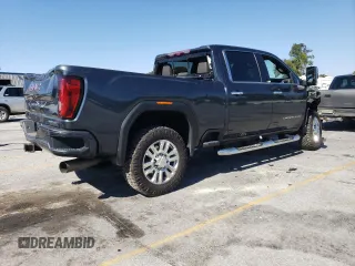2020 GMC Sierra 3500HD Denali z VIN 1GT49WEY9LF262769, wystawiony jako Copart lot #74386594 z przebiegiem 34 178 mil mil oraz Szkody całkowita. Historia ofert i sprzedaży dostępna na DreamBid. Obrazek 3.