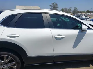 2021 Mazda CX-30 Select with VIN 3MVDMBBL9MM313039, listed as a IAAI auction lot 42575424 with 21,083 mi miles and . Bid and sale history available at DreamBid. Image 13.